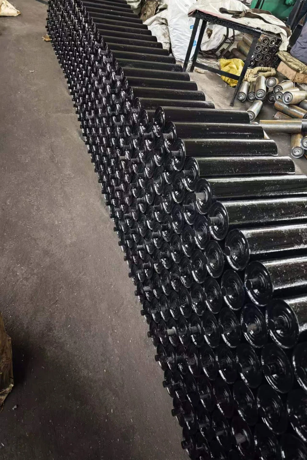 Standard conveyor idlers arranged during workshop production